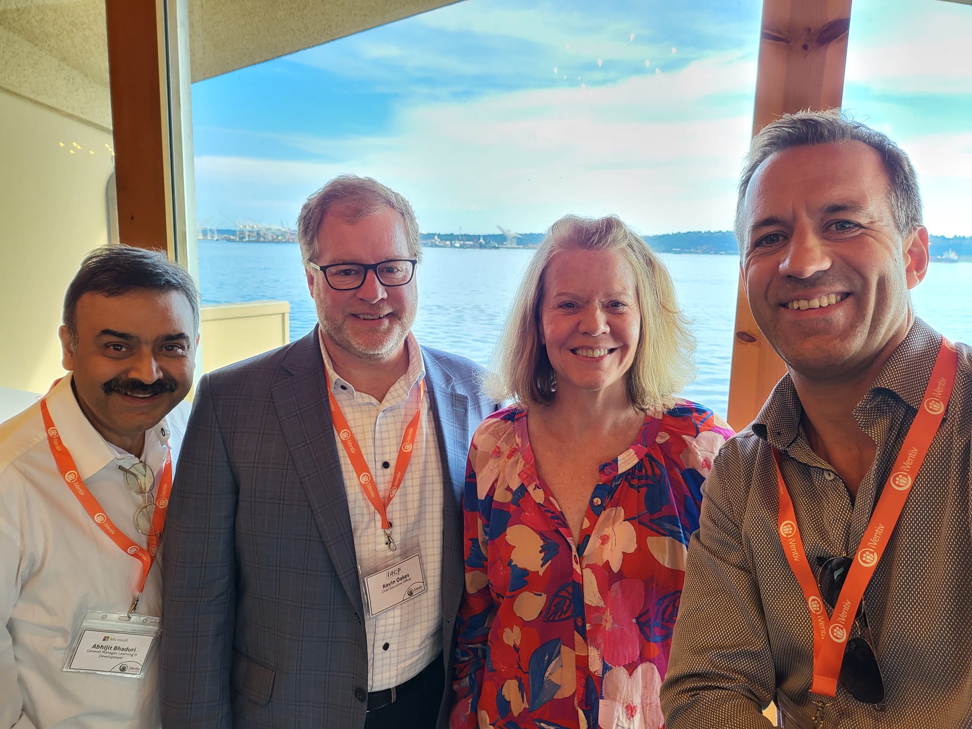 iVentiv CEO Russell Butler with Microsoft's Karen Kocher, Abhijit Bhaduri, and Kevin Oakes of i4CP at Learning Futures Seattle in 2023